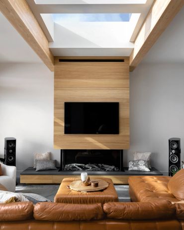 custom white oak fireplace paneling modern wood hearth tv millwork