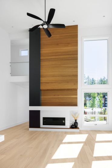 custom fireplace millwork white oak matte black modern contemporary cabinets Victoria BC