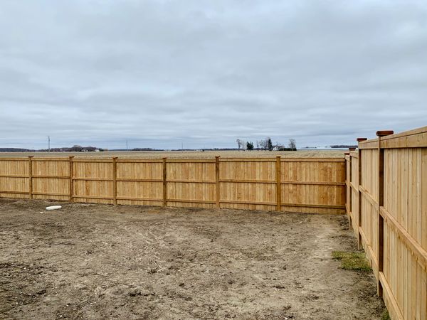 A 6ft tall, pressure treated fence surrounding the property. Camlachie, Ont