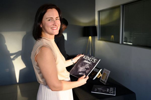 Anke Mostert holding her King's Journal.