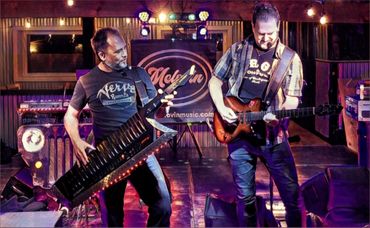 Mclovin entertaining fans with live music on stage