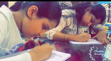 Group of students in a creative writing class in India.
