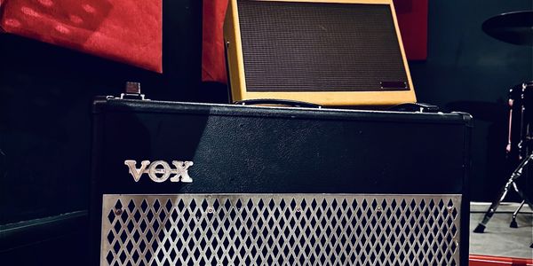Vox and Fender amps in the Pop City Music rehearsal room