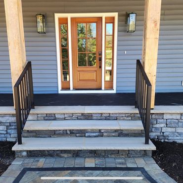 custom iron railing with simple design for a residential staircase