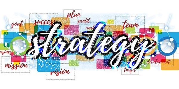 A colorful banner with the word strategy in a script in reference to online book marketing.