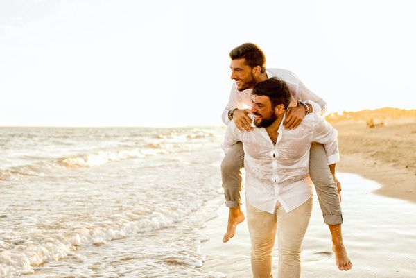 LGTBQ+ wedding couple on a beach. Gay couple