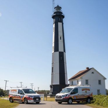 Randy Overacre vehicles in front of Cape Henry Light House at Fort Story.
