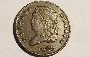 1825 classic head half cent coin showing front, obverse side of coin in about uncirculated condition