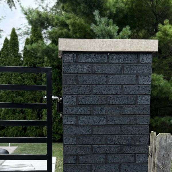 Recent project- modern black brick pier with black mortar