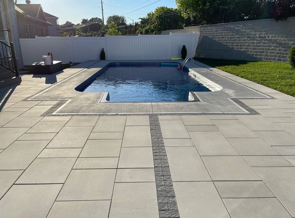 Pool installation and interlock installation with landscaping using Techo-Bloc interlock