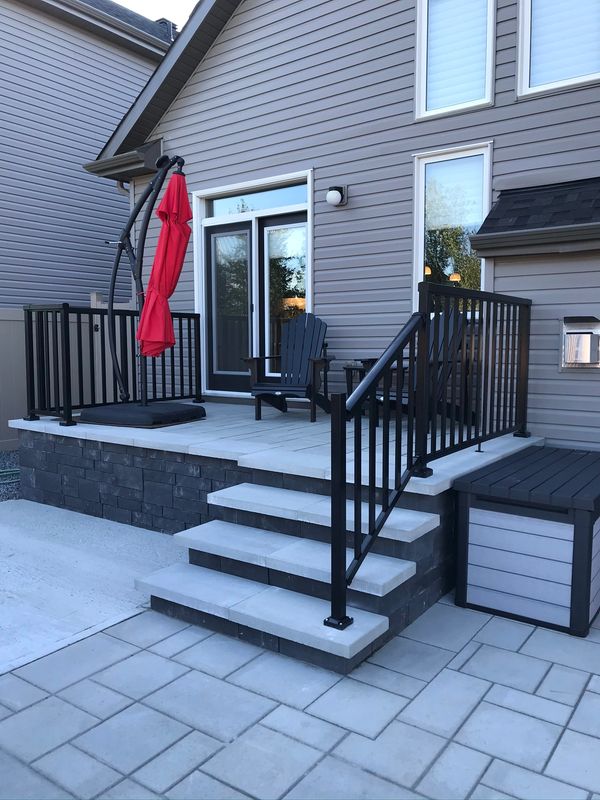 Interlock installation with outdoor patio and deck using Techo-Bloc interlock