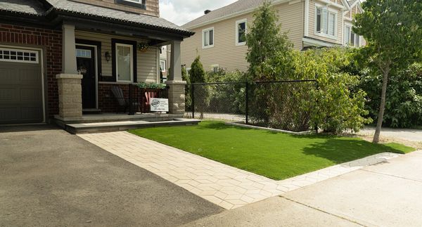 House front with interlock walkway, interlock step and artificial grass