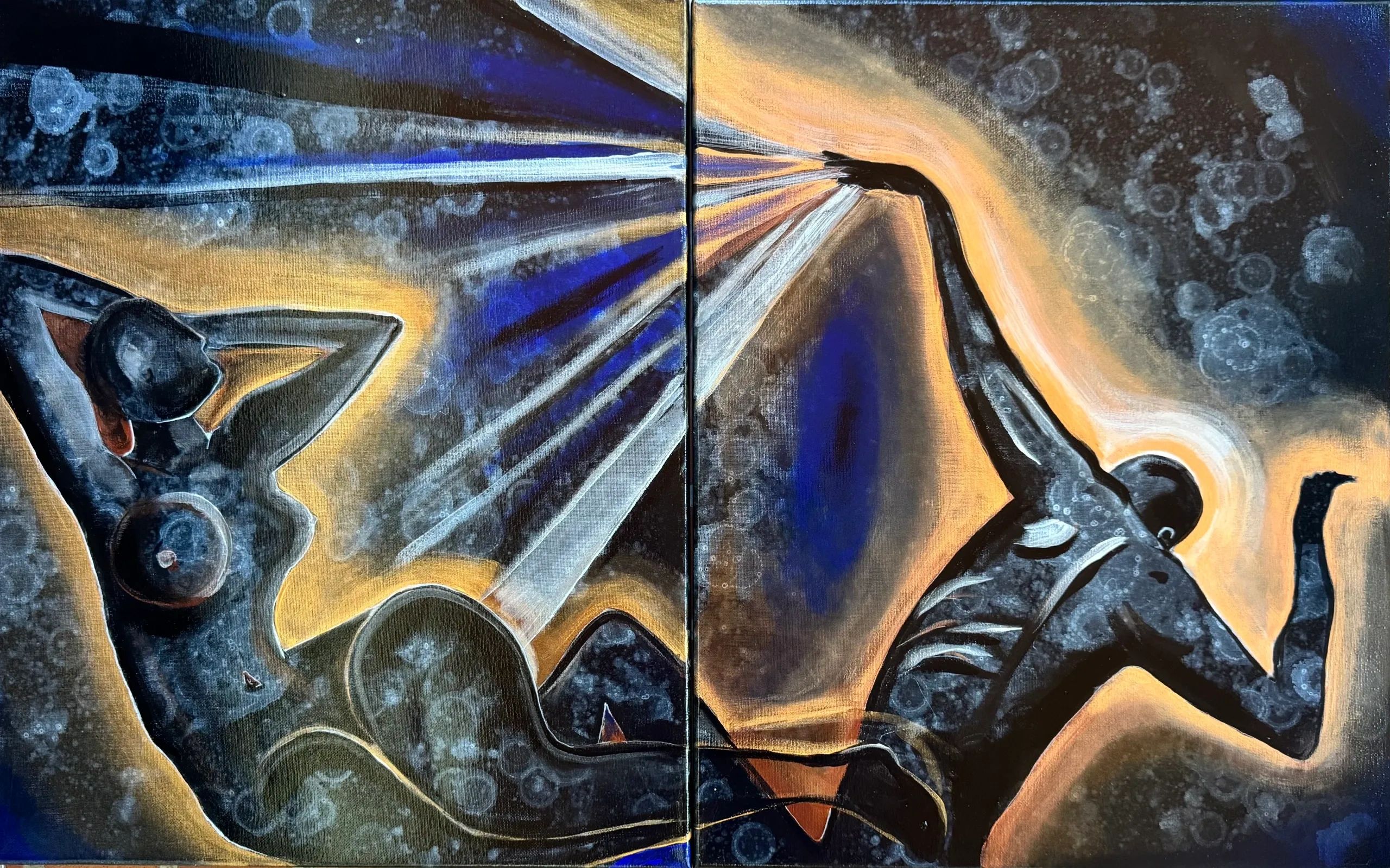 A female and male figure in black, on a black background with gold rays outlining them and white ray