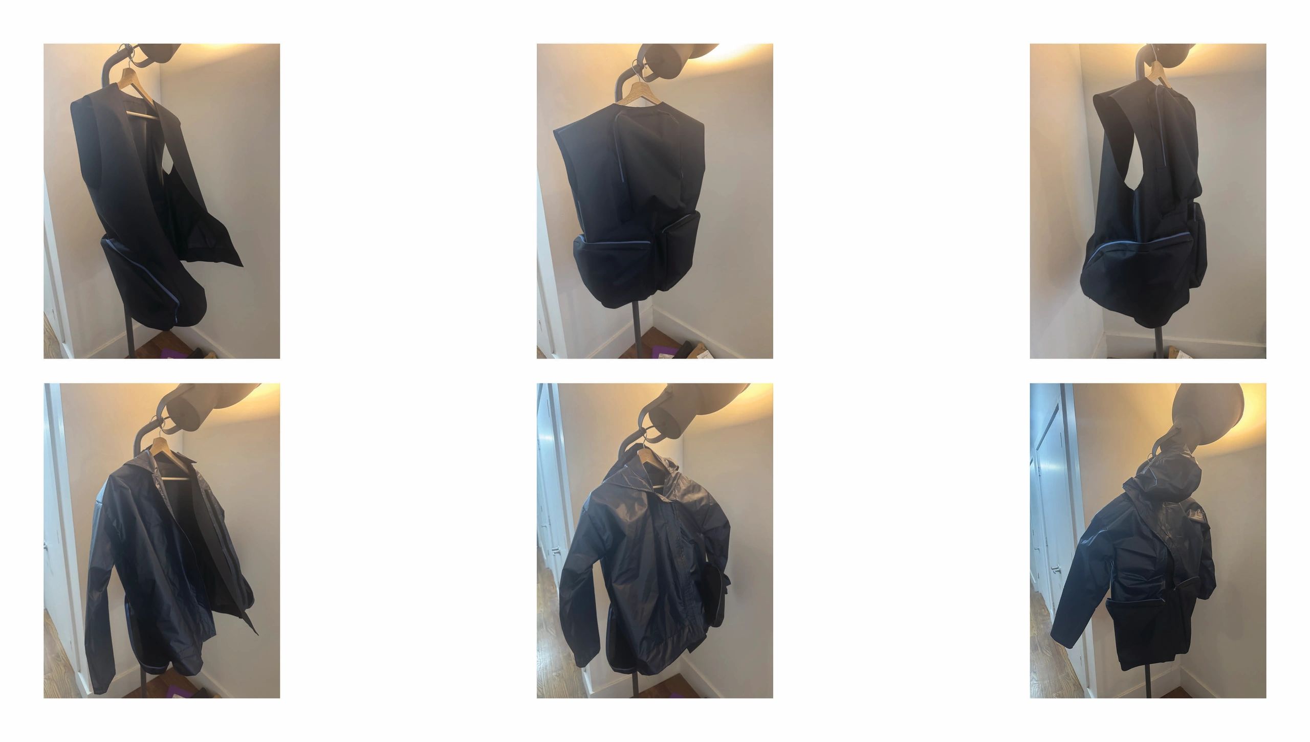 Black sleeveless vest and jacket displayed on a stand in a corner room.
