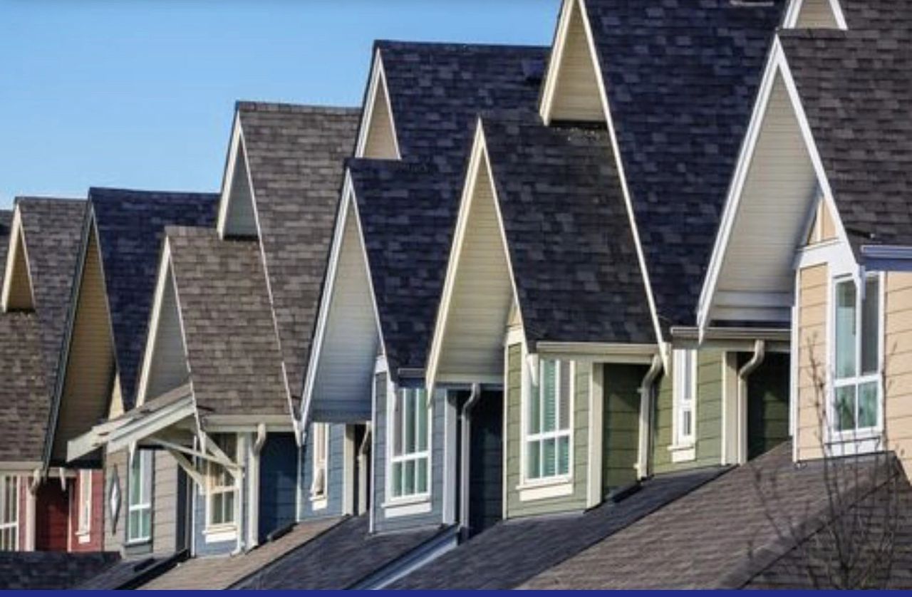 Neighborhood with shingles on roof Neighborhood with shingles on roof