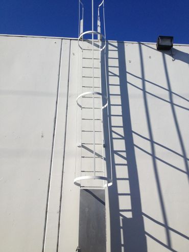A ladder on the side of a building