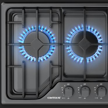 Top view of a gas stove with two burners on.