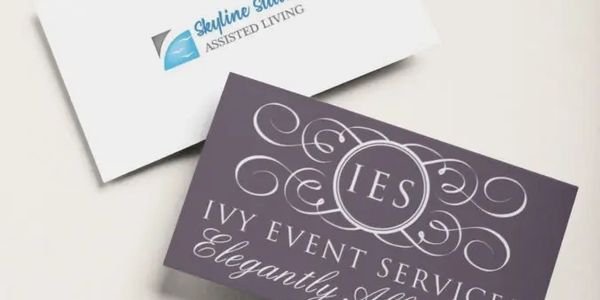 Two business cards, one for an assisted living service and one for an event service.