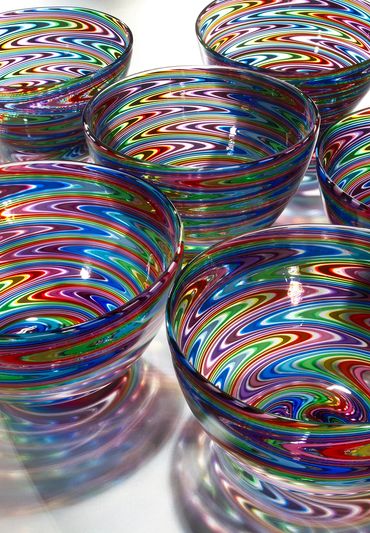 Collection of handblown rainbow wig-wag patterned glass bowls