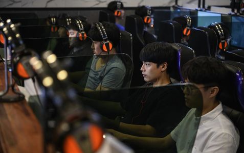 GAMES AT AN SPORTS CAFE IN SOUL. CONCERN OVER VIDEO GAMES' EFFECTS HAVE LED SOUTH KOREA TO CONSIDER 