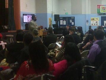 Pastor speaking to an attentive audience