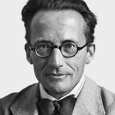 Black and white portrait of a man with round glasses.