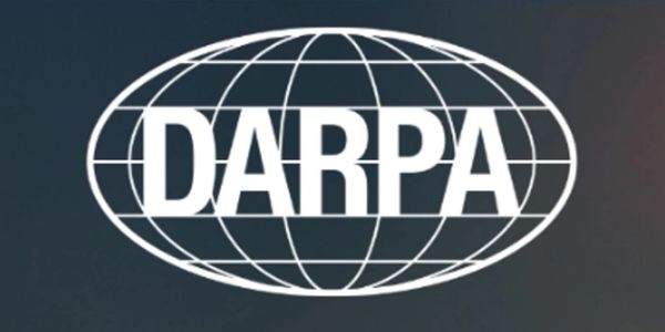 White DARPA logo with globe grid on dark background.