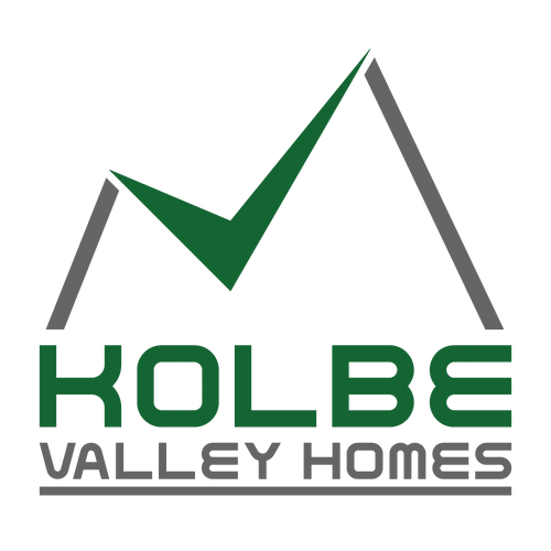 A building under construction with wooden beams and roof.