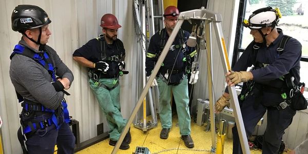 confined space rescue team with tripod