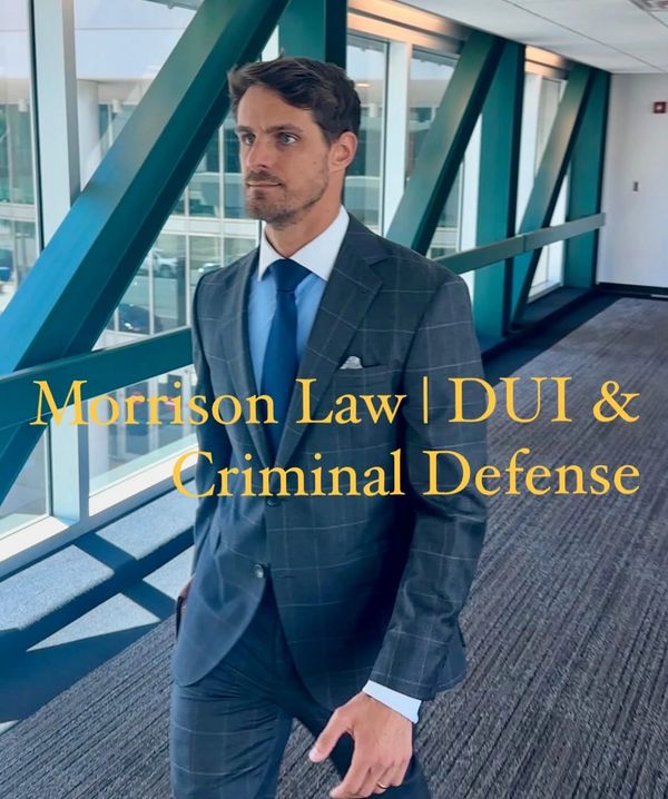 Zach Morrison in a suit representing Morrison Law for DUI and criminal defense.