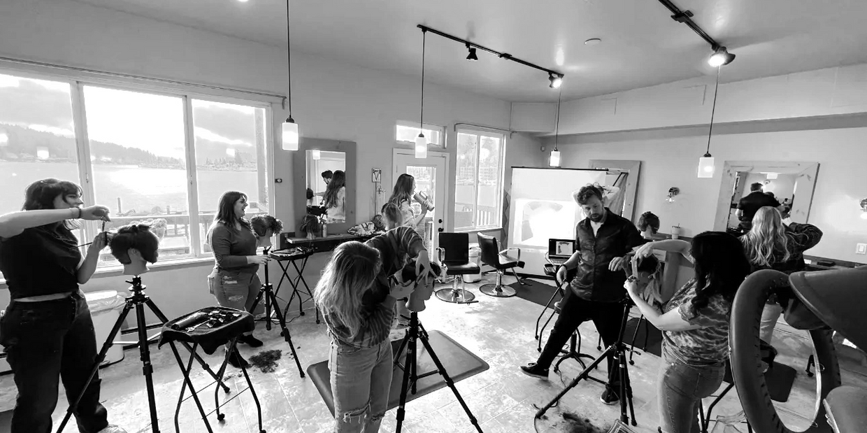 An in salon barbering class at a waterfront salon in gig harbor.