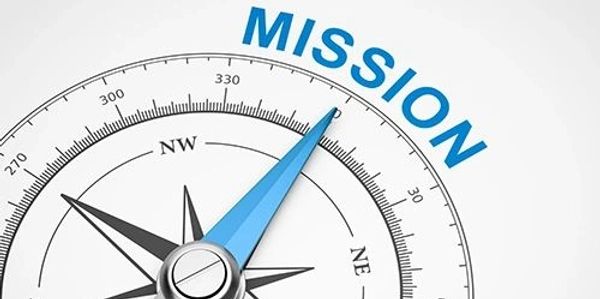 Compass needle pointing towards the word MISSION symbolizing direction and purpose.