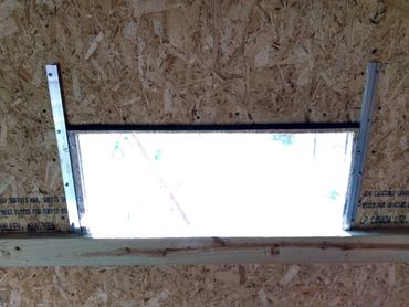 DIY deer blind deer stand window in h track. 