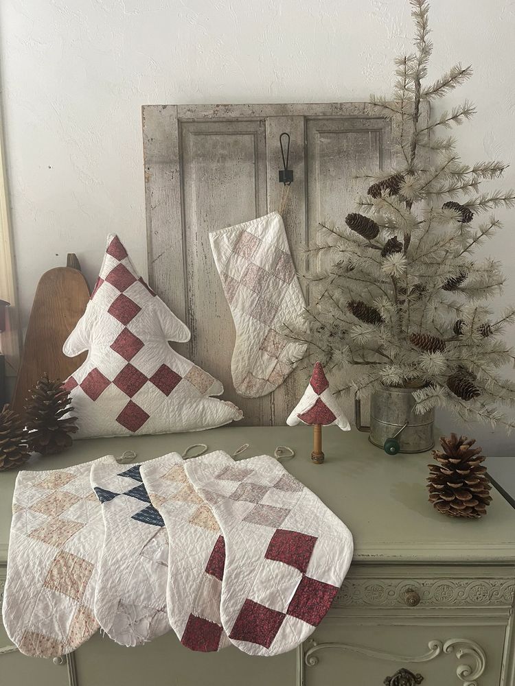 Light blue rocking chair with a floral cushion on a porch.