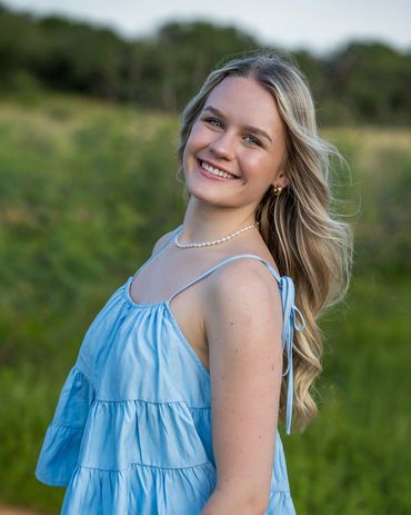 Girl with blonde hair smiling