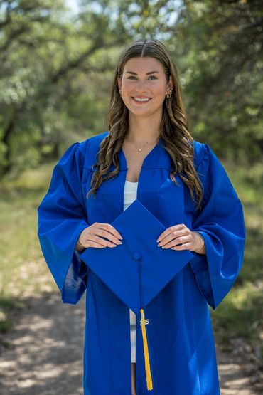 Girl holding graduation cap