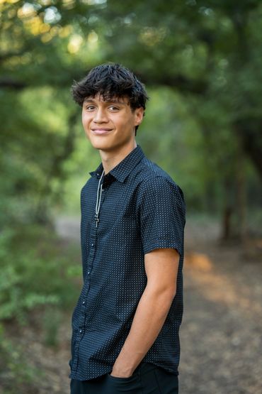 High-school-teen-boy-smiling-in-Leander-park