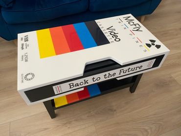 A VHS-themed coffee table with 'Back to the Future' design.