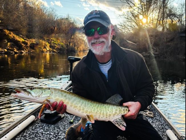 Stratton Hunter holding a Muskie