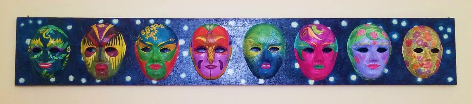Masks painted, mounted and photographed by O.E. Fitzgerald 2021.