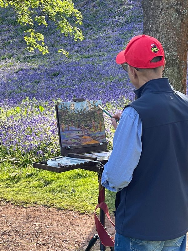 Artist painting en plein air in Clent Hills.