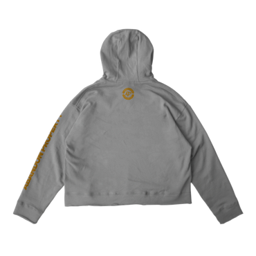 Gray hoodie with a small gold logo on the back and gold text on the sleeve.