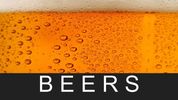 Close-up of beer with bubbles and the word BEERS below.