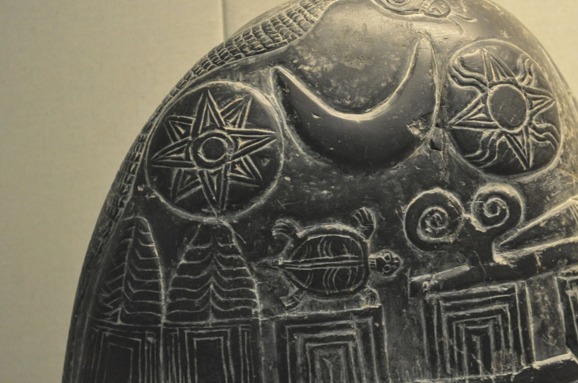 Ancient Sumerian Stone Displaying the Sun, Moon, and the radiating planet of the Annunaki, Nibiru.