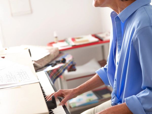 Amy Layne Litzelman playing keyboard.