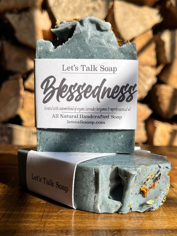 TWO SOAPS. BLUE IN COLOR. DISPLAYED ON TABLE. NEW FALL SOAP SCENTS.