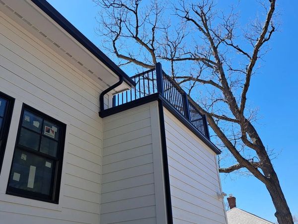 seamless gutter installation; Color black