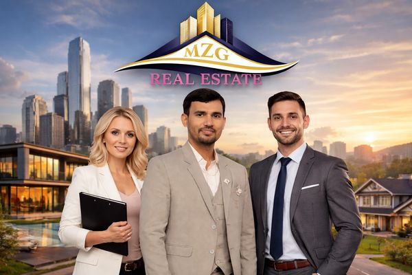 Three real estate agents posing with city skyline and houses at sunset.