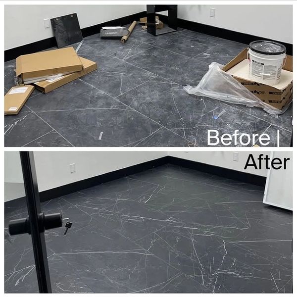 Before and after cleaning of a dark tiled floor.