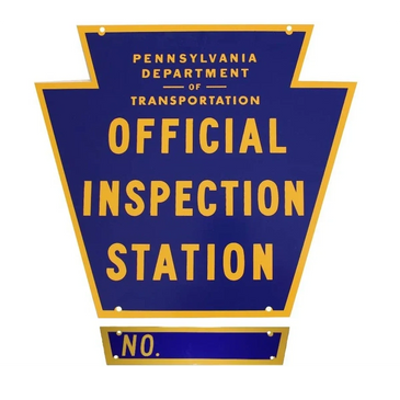 Pennsylvania Department of Transportation official inspection station sign in blue and yellow.